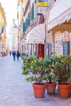 Macerata, Italy - February 21, 2021: People enjoying sunny day.