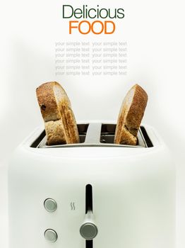 Toasted bread and toaster for breakfast.