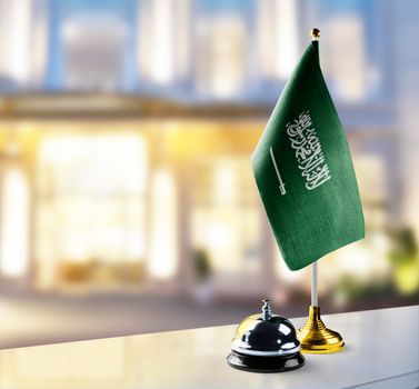 Saudi Arabia flag on the reception desk in the lobby of the hotel