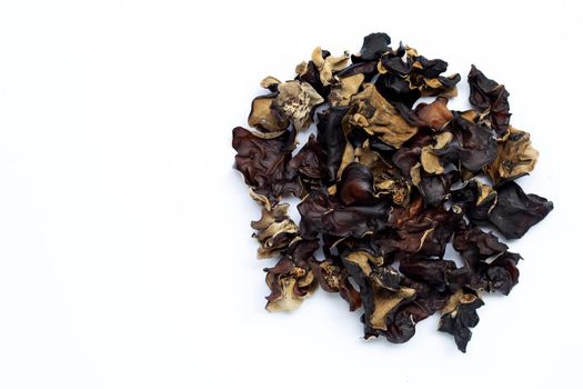 Dried black fungus on white background.