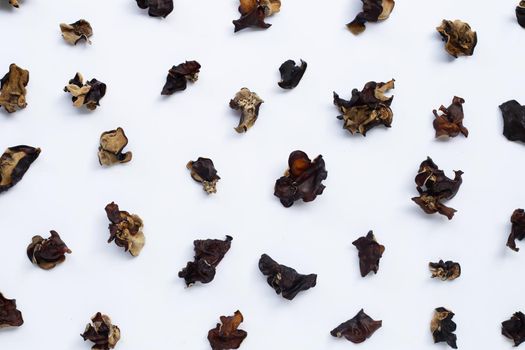 Dried black fungus on white background.