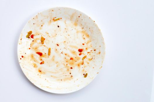 Dirty dish on white background.