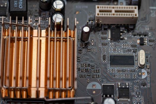 detail of a motherboard with connectors and heatsinks