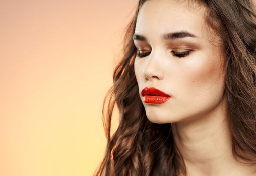 Woman portrait red lips shadows on eyelids brunette eyebrows