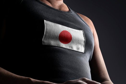 The national flag of Japan on the athlete's chest