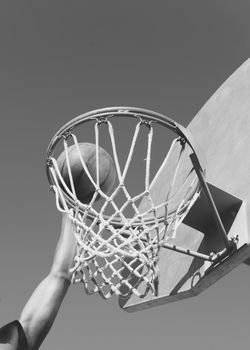 Black and white photo of Player Dunking the Ball