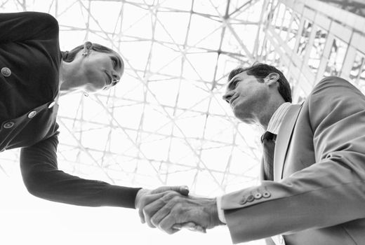 Black and White photo of business partners shaking hands