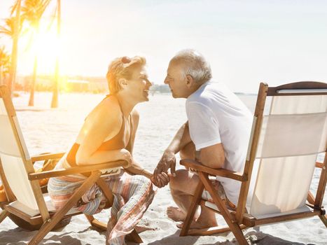 Portrait of senior couple showing affection on the beach