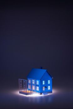 Extending little blue model house with ladder