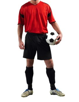 Cropped Soccer Player holding football in studio