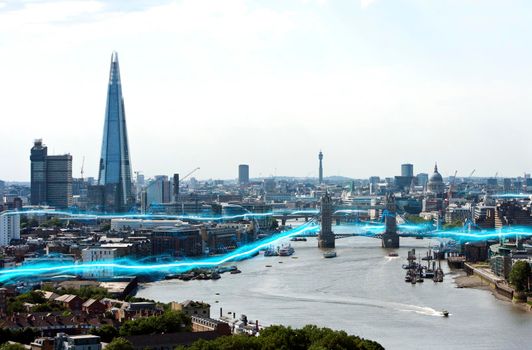 Elevated view of Tower Bridge, The Shard, and St Pauls in London