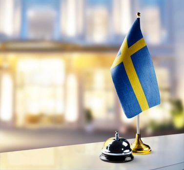 Sweden flag on the reception desk in the lobby of the hotel