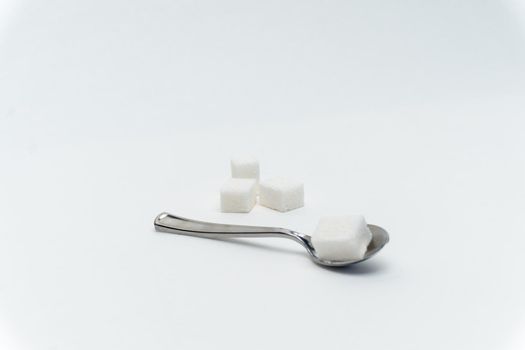 sugar cubes in a teaspoon sweets calorie ingredient Glucose