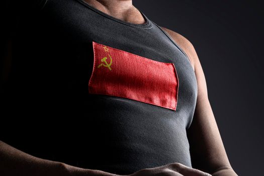 The national flag of USSR on the athlete's chest