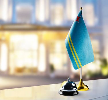 Aruba flag on the reception desk in the lobby of the hotel