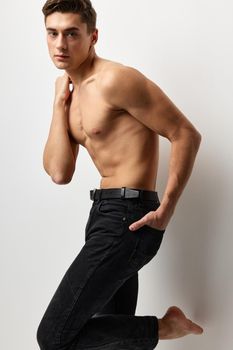 male topless black jeans posing fashion self confidence