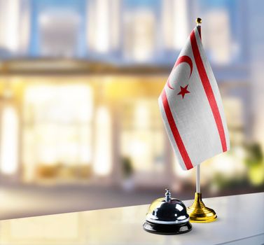Northern Cyprus flag on the reception desk in the lobby of the hotel