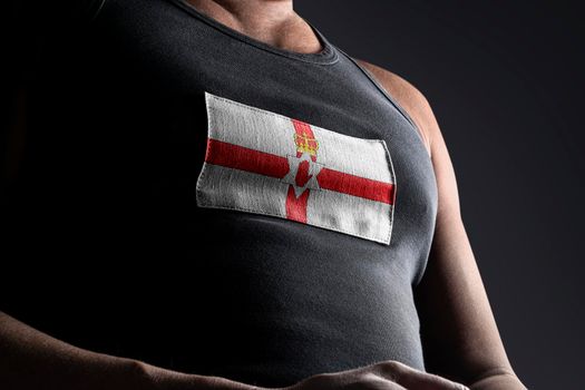 The national flag of Northern Ireland on the athlete's chest