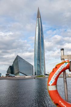 Russia, St.Petersburg, 06 July 2020: The skyscraper Lakhta center through a lifebuoy at day time, It is the highest skyscraper in Europe, completion of construction