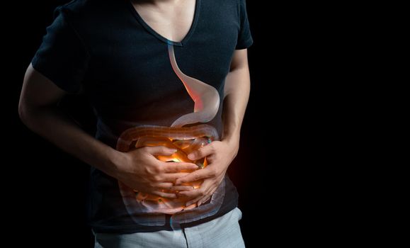 Man abdominal pain, photo of large intestine on body, stomachache diarrhea symptom, menstrual period cramp or food poisoning. Health care concept.