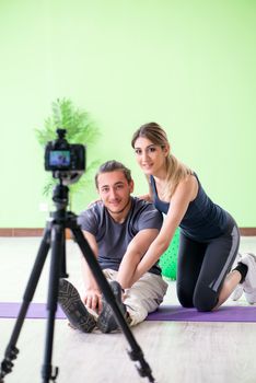 Pair recording sports video for vlog