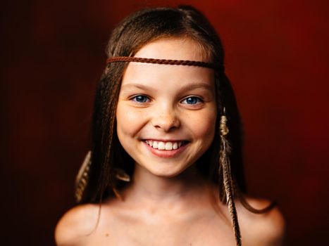 wild girl with feather in her hair smile loose hair indian culture