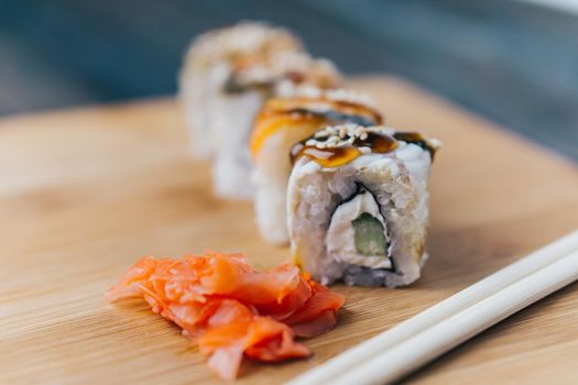 sushi chopsticks japanese cuisine gourmet restaurant close-up
