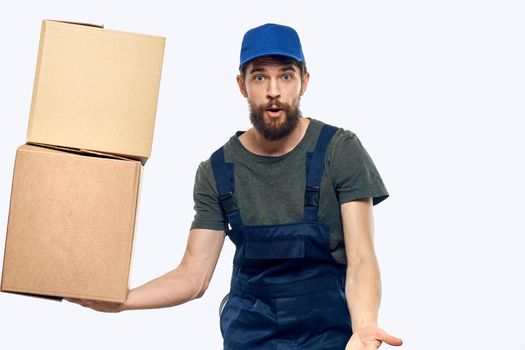 Man worker in uniform providing loading delivery service
