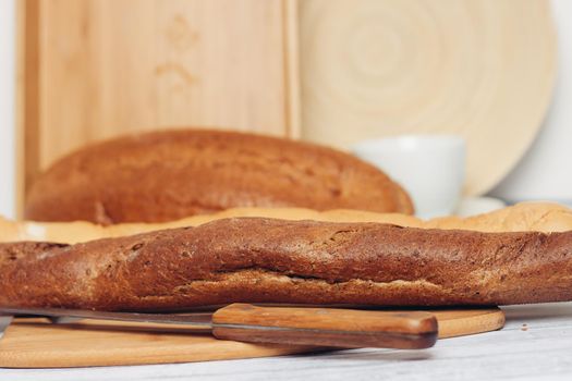 long loaf baked goods cutting board bread
