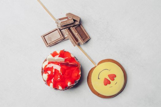 gingerbread in the form of a smiley on a stick marmalade sweets dessert
