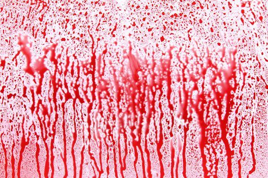Red Dropping Splatters on White Surface