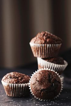 Homemade chocolate muffins, baked comfort food recipe