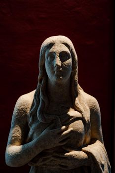 Sculpture of antiquity in the form of a statue of a woman.