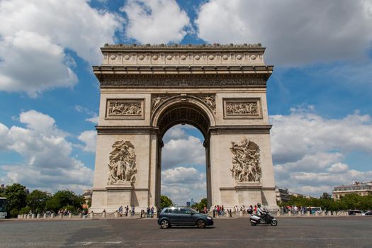 Majestic triumphal arch from Paris under beautiful blue sky