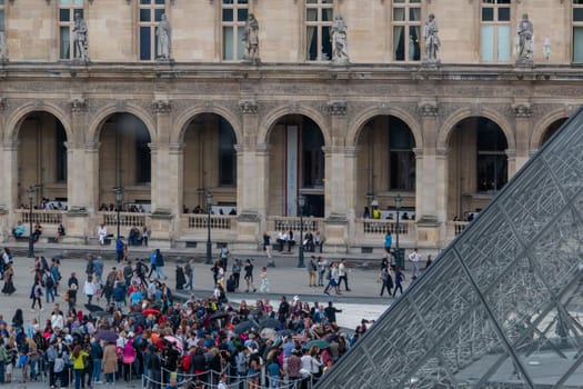 Big group of people outside the Louvre Museum in Paris