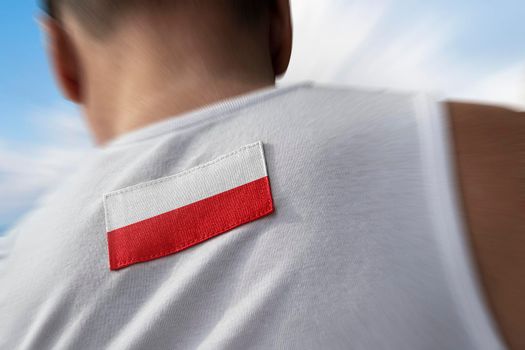 The national flag of Poland on the athlete's back