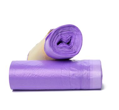 skein of purple plastic trash bags with strings isolated on white background