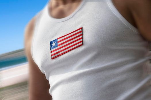 The national flag of Liberia on the athlete's chest