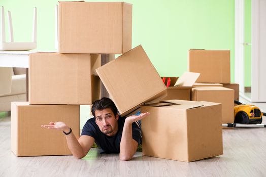Man moving house with boxes