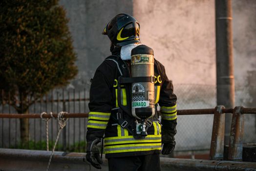 Firefighter with oxygen bottle