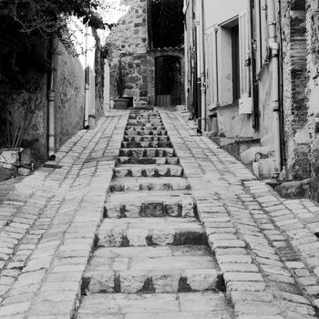 alley in the picturesque Provencal village Grimaud, France
