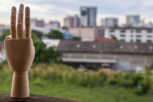 Wooden Hand Puppet showing three fingers hand.