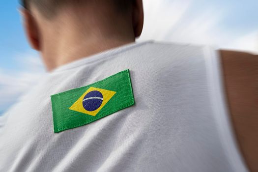 The national flag of Brazil on the athlete's back