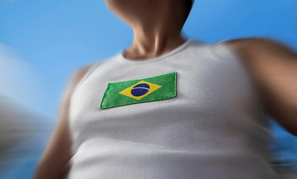 The national flag of Brazil on the athlete's chest