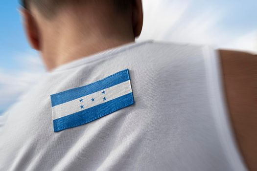 The national flag of Honduras on the athlete's back