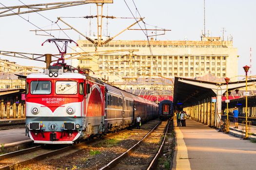 Detail of train in motion at train platform at Bucharest North Railway Station (Gara de Nord Bucharest) in Bucharest, Romania, 2020