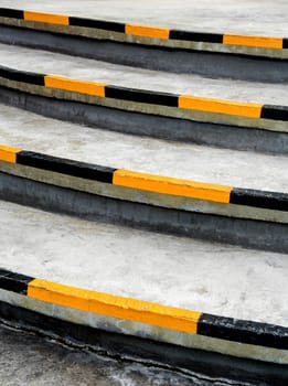 Yellow and black stripes, safety symbols at the edge of the stairs