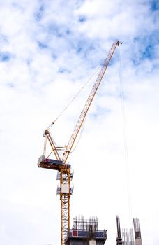 Tower crane working in construction site