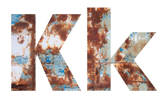 Rusty metal letter K Old metal alphabet isolated on white background.