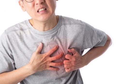 middle age man has a heart attack symptom.